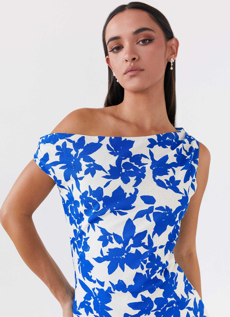 Womens Pyper Off Shoulder Maxi Dress in the colour Blue Floral in front of a light grey background