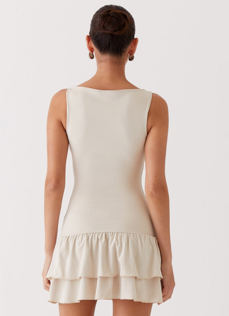 Womens Rhiannon Frill Mini Dress in the colour Ivory in front of a light grey background