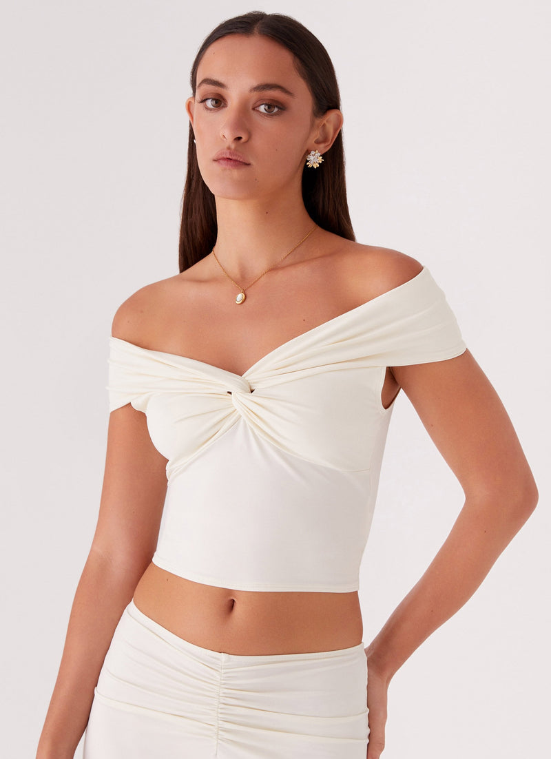 Womens Trixie Twist Off Shoulder Top in the colour Ivory in front of a light grey background