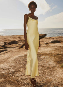 Womens Joanna Satin Maxi Dress in the colour Lemon in front of a light grey background