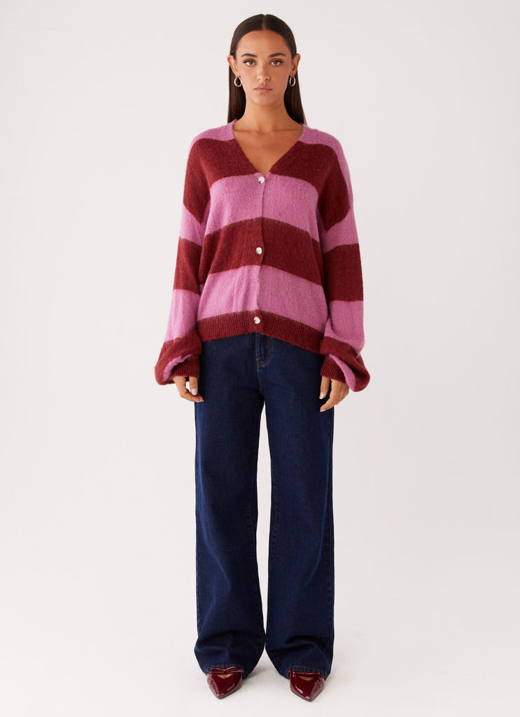 Womens Ainslee Oversized Knit Cardigan in the colour Red Pink Stripe in front of a light grey background