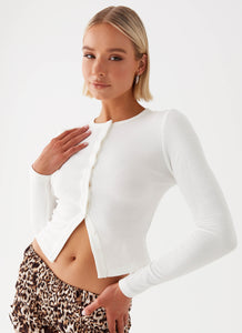 Womens Blair Buttoned Long Sleeve Top in the colour White in front of a light grey background