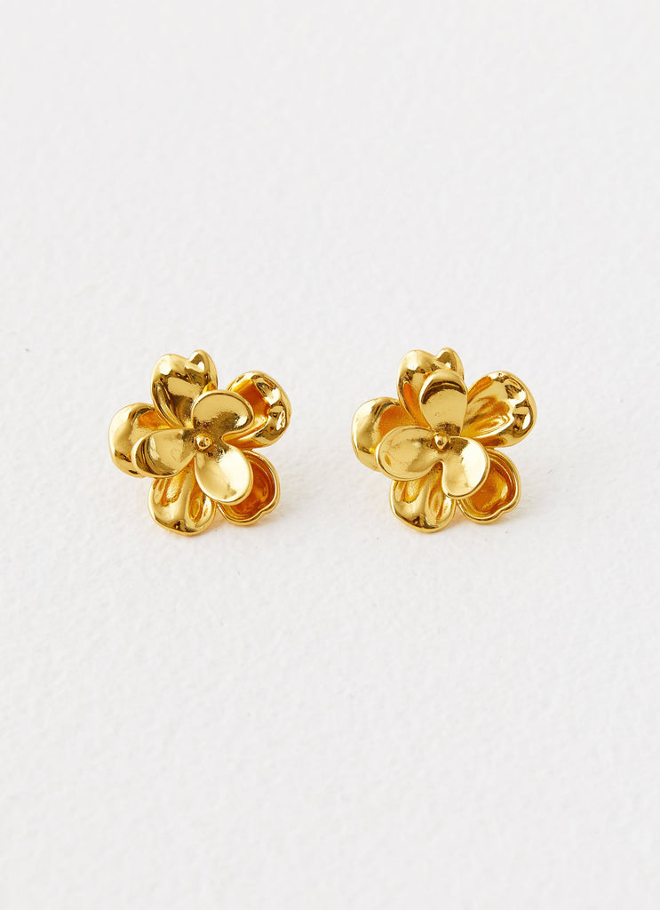 Womens Bold Rosette Earrings in the colour Gold in front of a light grey background