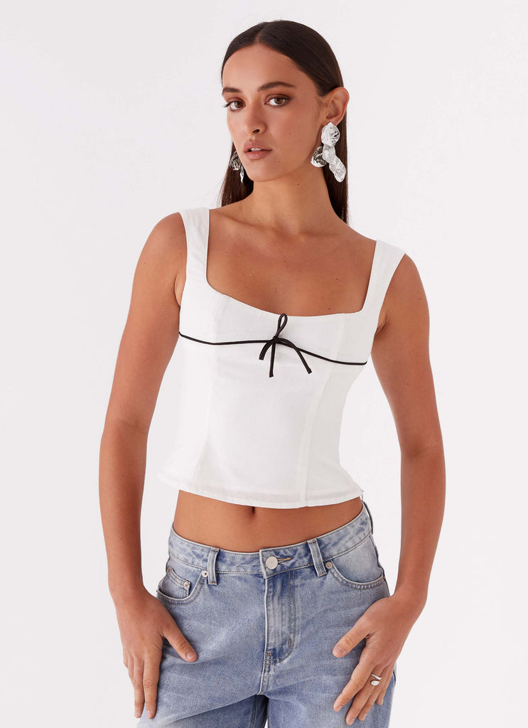 Womens Cadence Top in the colour White in front of a light grey background