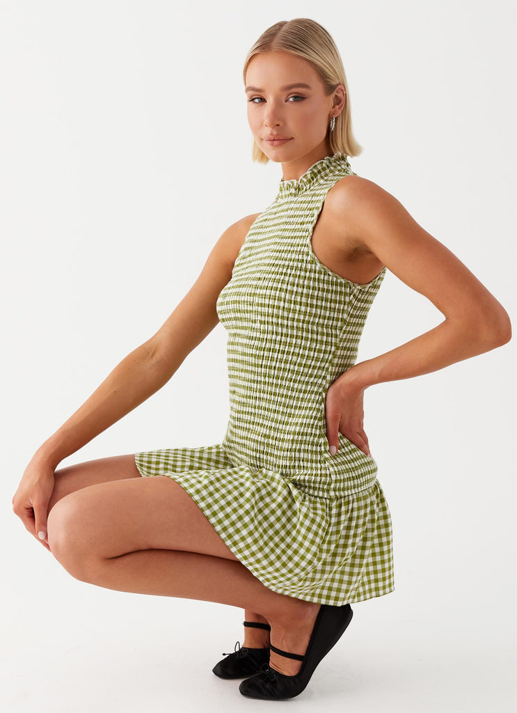 Womens Cassie shirred Mini Dress in the colour Khaki Gingham in front of a light grey background