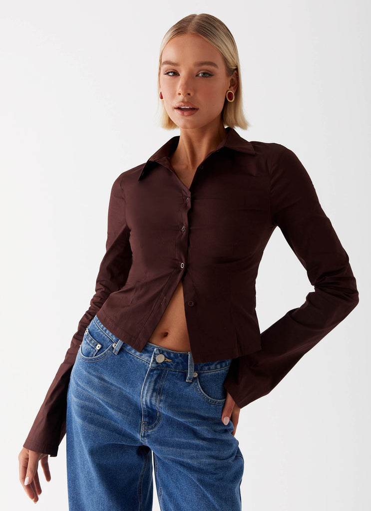 Womens Leah Fitted Button Up Shirt in the colour Chocolate in front of a light grey background