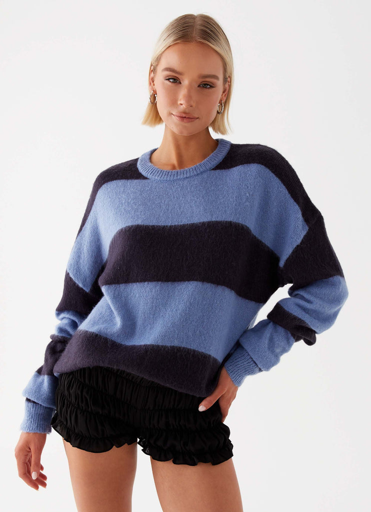 Womens Nikita Fuzzy Knit Sweater in the colour Blue Black Stripe in front of a light grey background