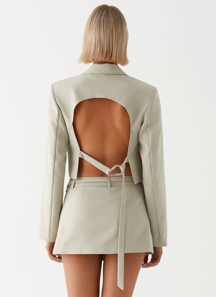 Womens Olea Open Back Cropped Blazer in the colour Sage in front of a light grey background