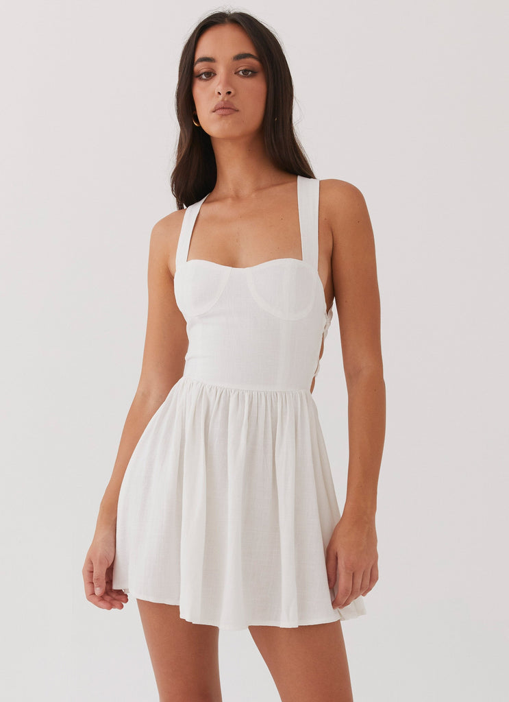 Womens Penelope Linen Mini Dress in the colour Ivory in front of a light grey background