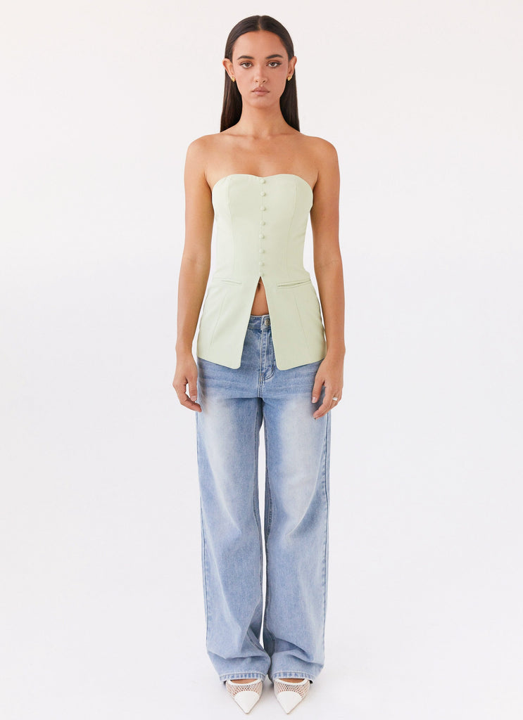 Womens Riveria Tailored Strapless Top in the colour Green Zest in front of a light grey background