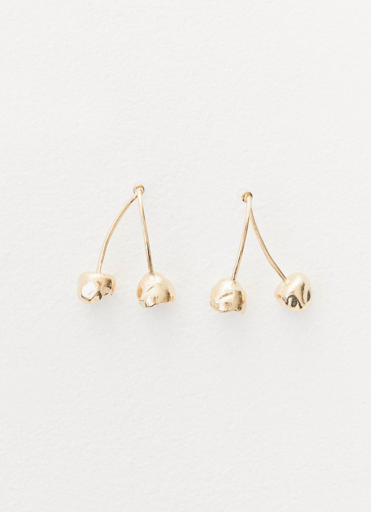 Womens Cherry Forever Earrings in the colour Gold in front of a light grey background