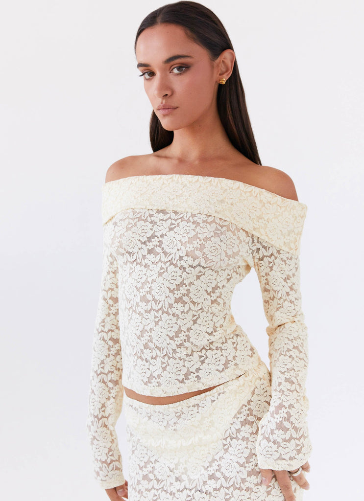 Womens Zephyra Lace Long Sleeve Top in the colour Natural in front of a light grey background