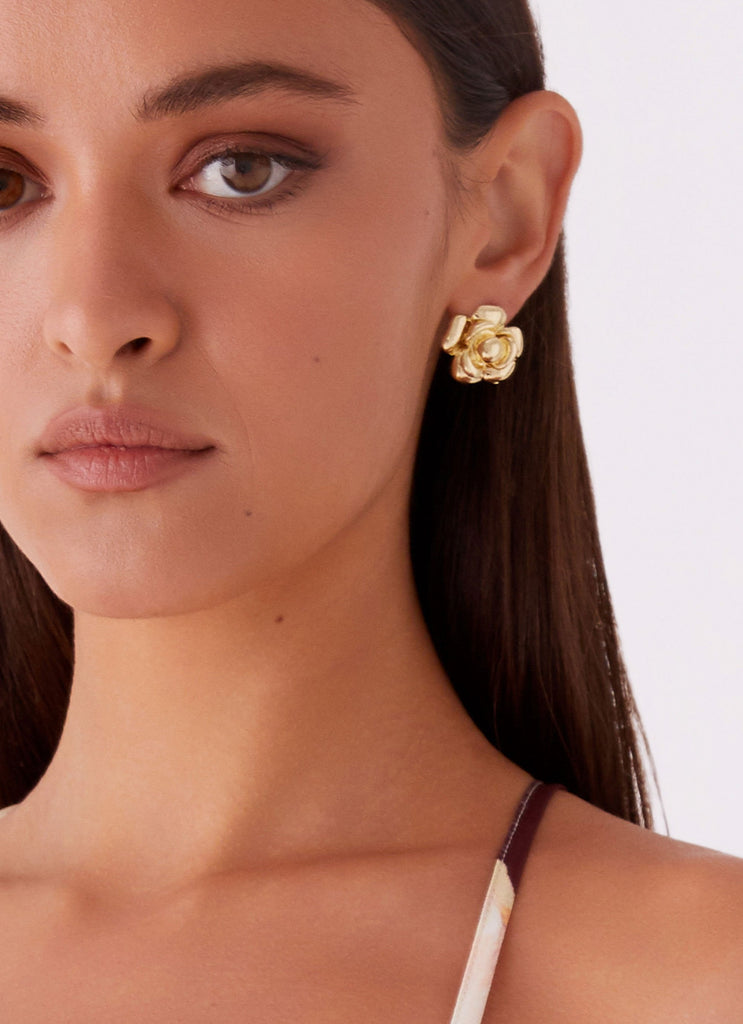 Womens Pretty In Bloom Earrings in the colour Gold in front of a light grey background