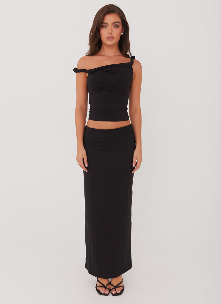 Womens Solace Soul Maxi Skirt in the colour Black in front of a light grey background