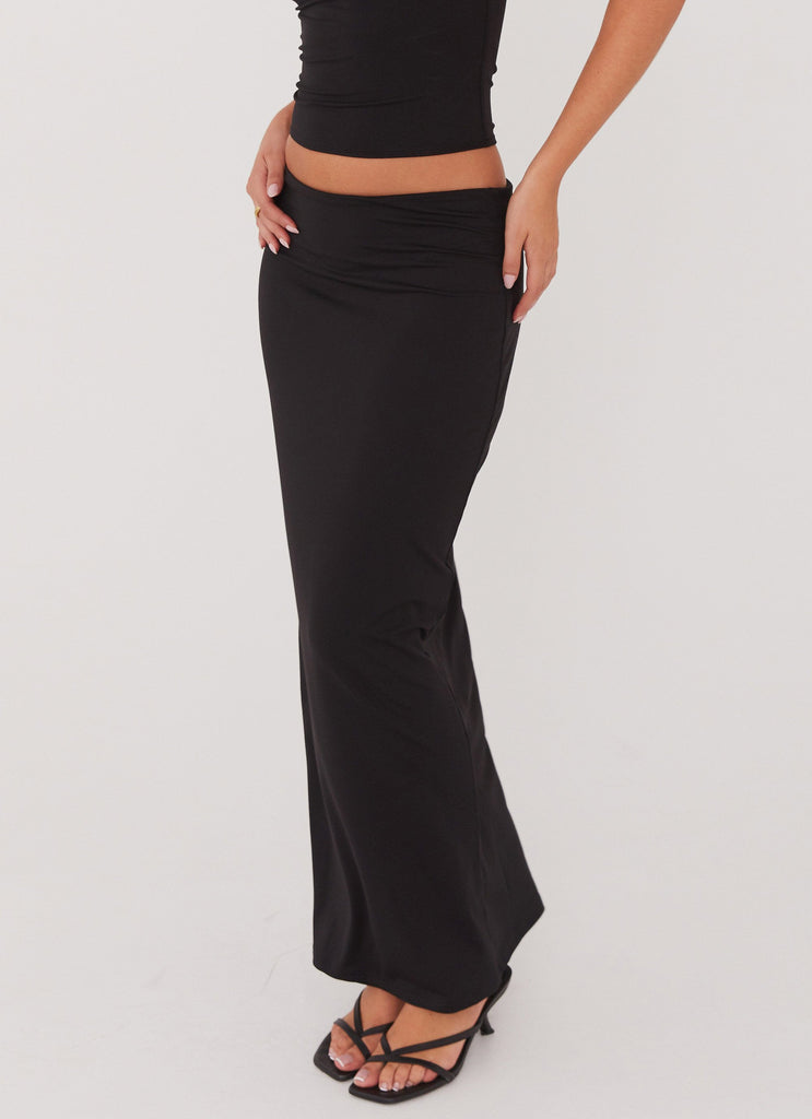 Womens Solace Soul Maxi Skirt in the colour Black in front of a light grey background