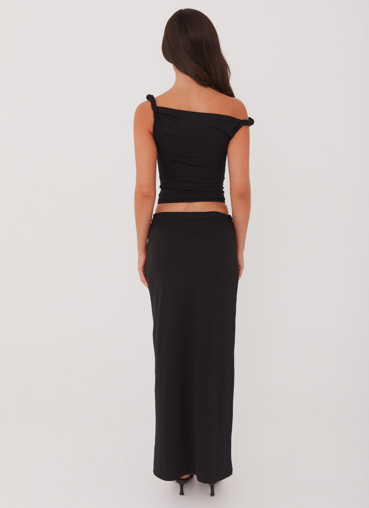 Womens Solace Soul Maxi Skirt in the colour Black in front of a light grey background