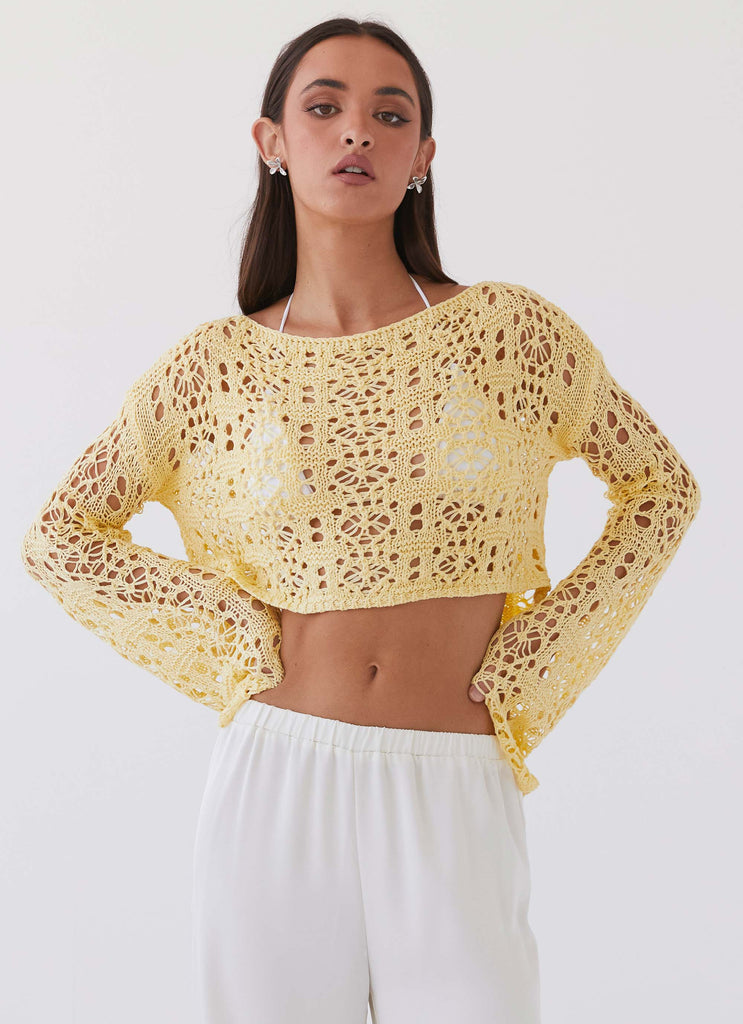 Womens Free Mind Crochet Long Sleeve Top in the colour Marigold in front of a light grey background