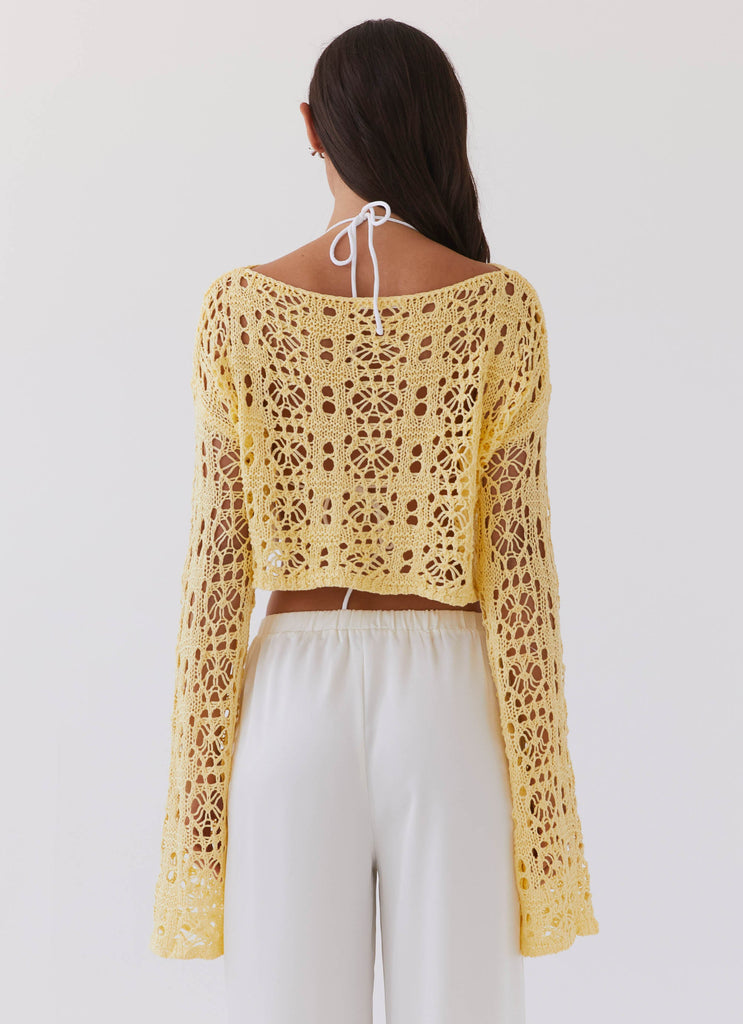 Womens Free Mind Crochet Long Sleeve Top in the colour Marigold in front of a light grey background