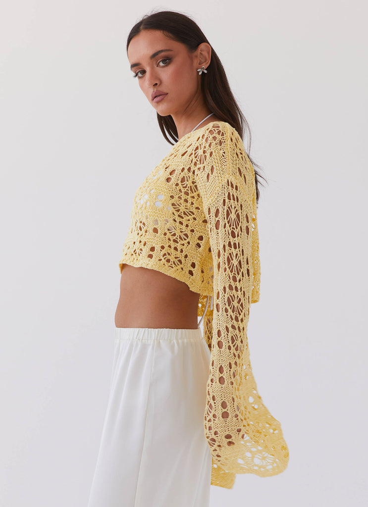 Womens Free Mind Crochet Long Sleeve Top in the colour Marigold in front of a light grey background