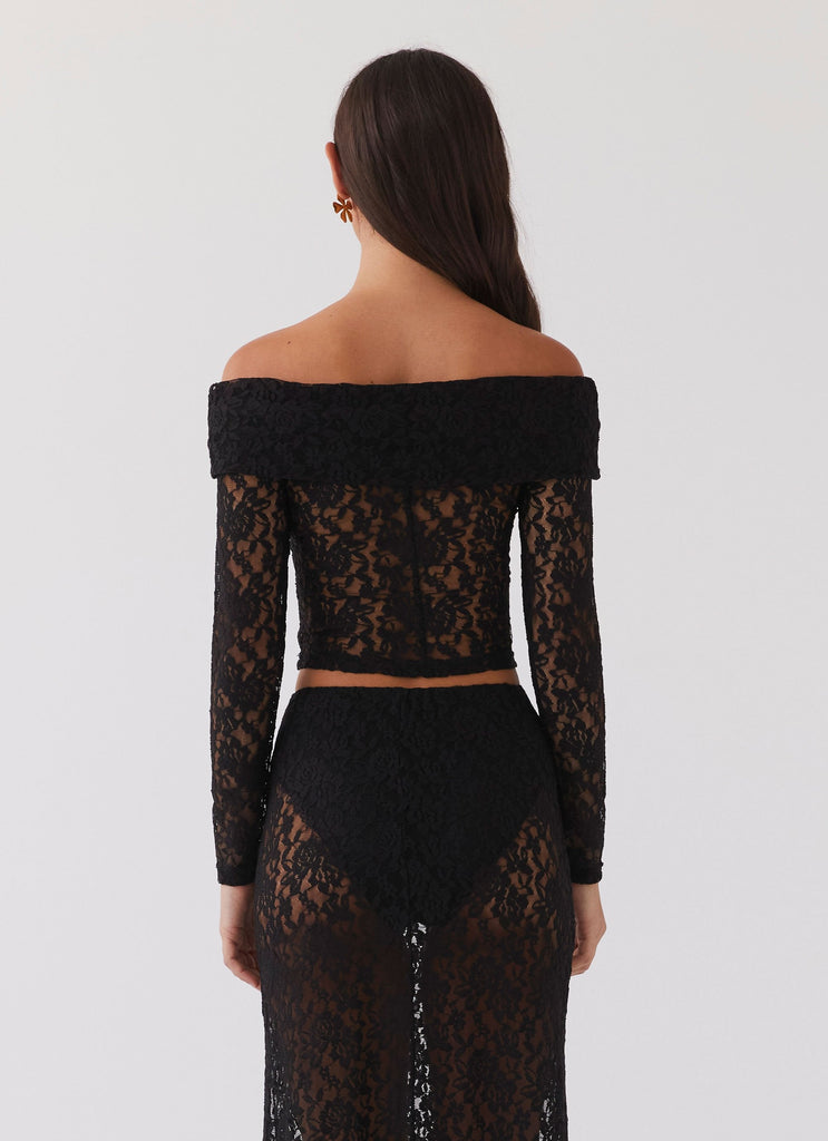 Womens Zephyra Lace Long Sleeve Top in the colour Black in front of a light grey background