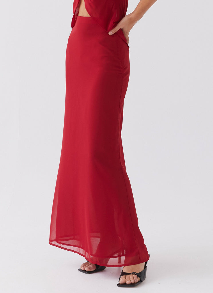 Womens Nightfall Maxi Skirt in the colour Rouge Red in front of a light grey background