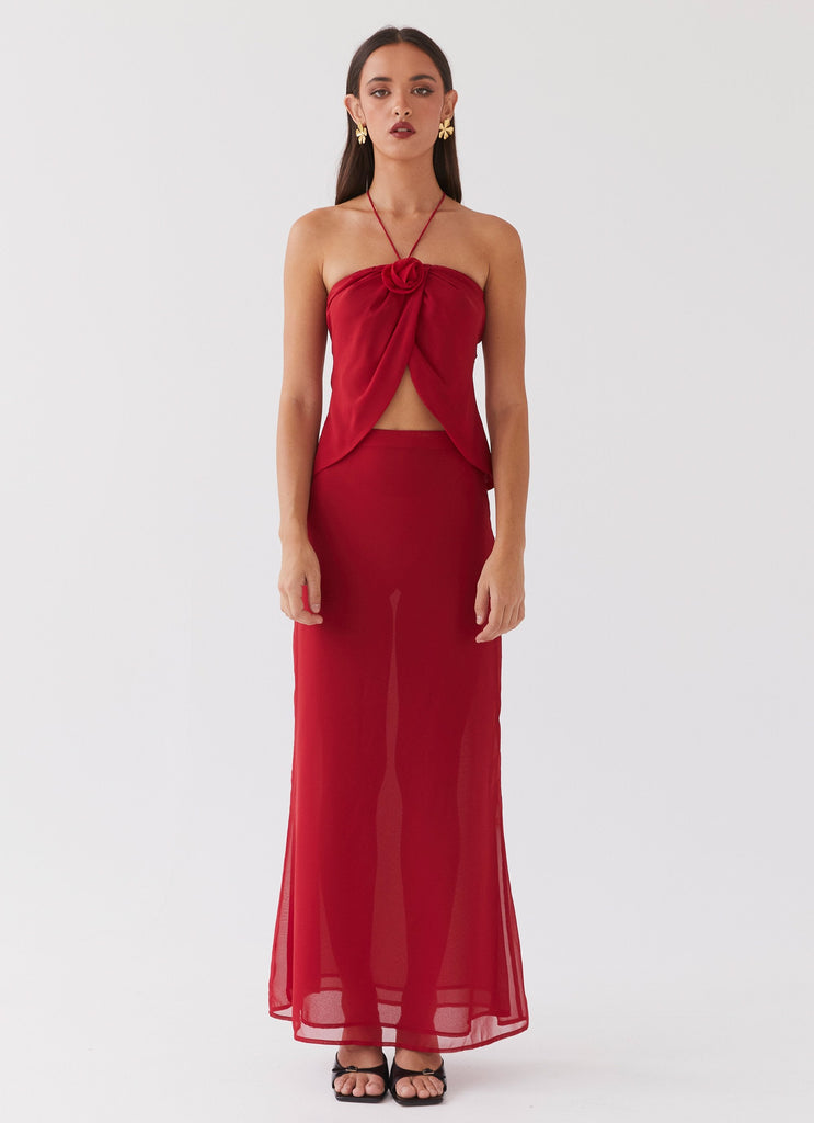 Womens Nightfall Maxi Skirt in the colour Rouge Red in front of a light grey background