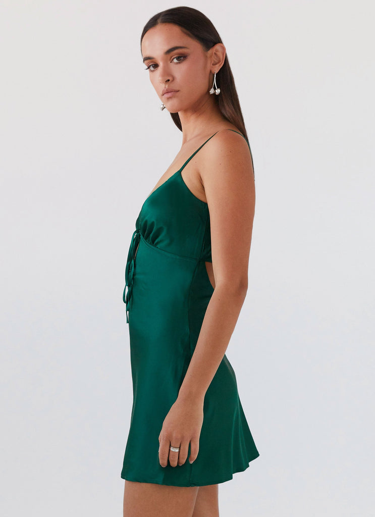 Womens Flora Satin Mini Dress in the colour Forest Green in front of a light grey background