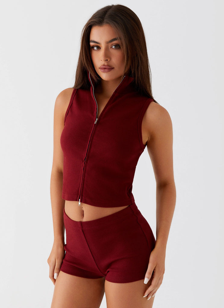 Womens Spectate Collar Top in the colour Maroon in front of a light grey background