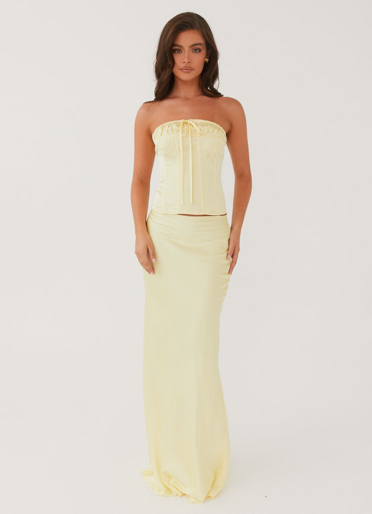 Womens Golden Grace Bustier Top in the colour Lemon in front of a light grey background