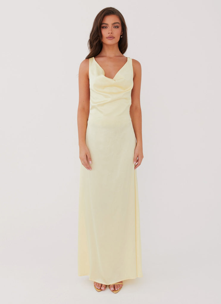 Womens Musa Maxi Dress in the colour Lemon in front of a light grey background