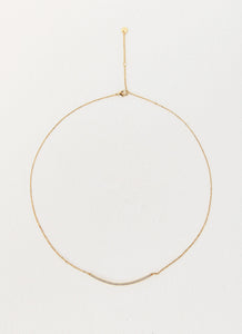 Womens Sweet Harmony Pendant Necklace in the colour Gold in front of a light grey background