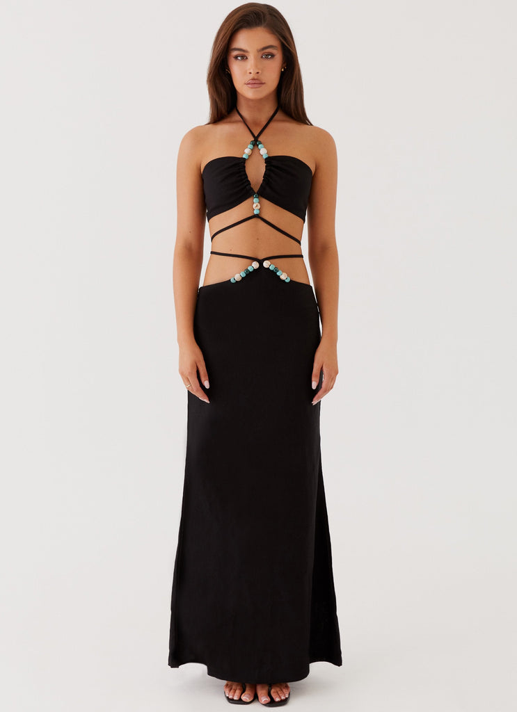 Womens Neveah Beaded Maxi Skirt in the colour Black in front of a light grey background