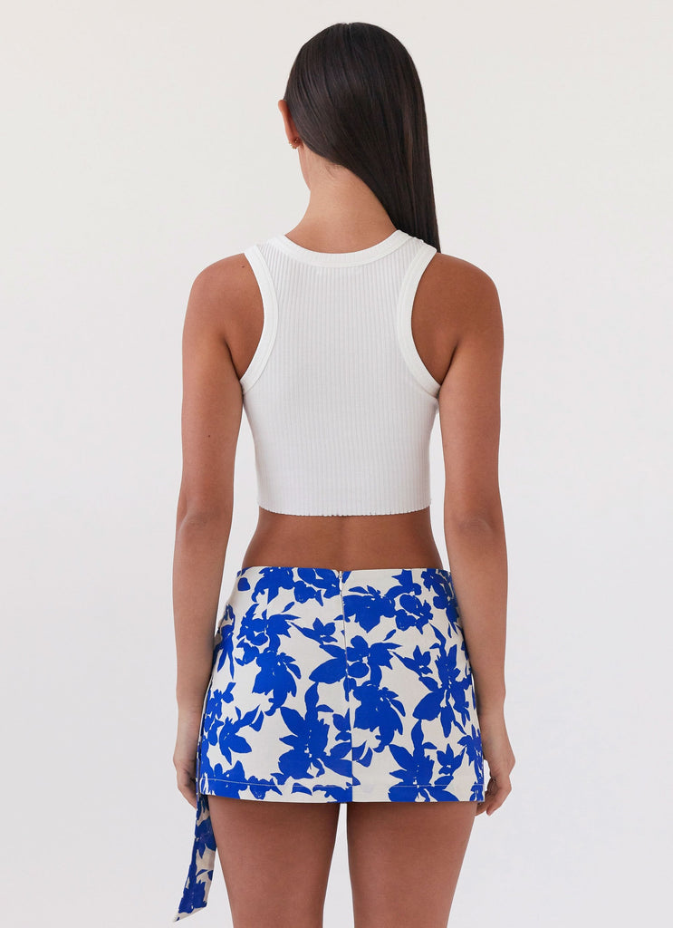Womens Steal Away Linen Wrap Skirt in the colour Blue Floral in front of a light grey background