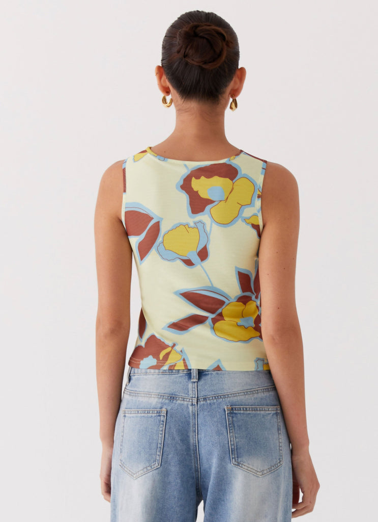 Womens Beyond Cut Out Mesh Top in the colour Primrose in front of a light grey background