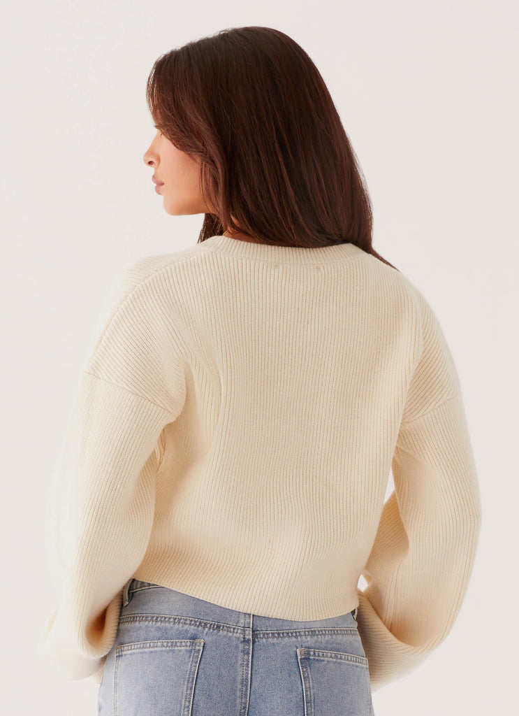 Womens Daphne Knit Cardigan in the colour Ivory in front of a light grey background