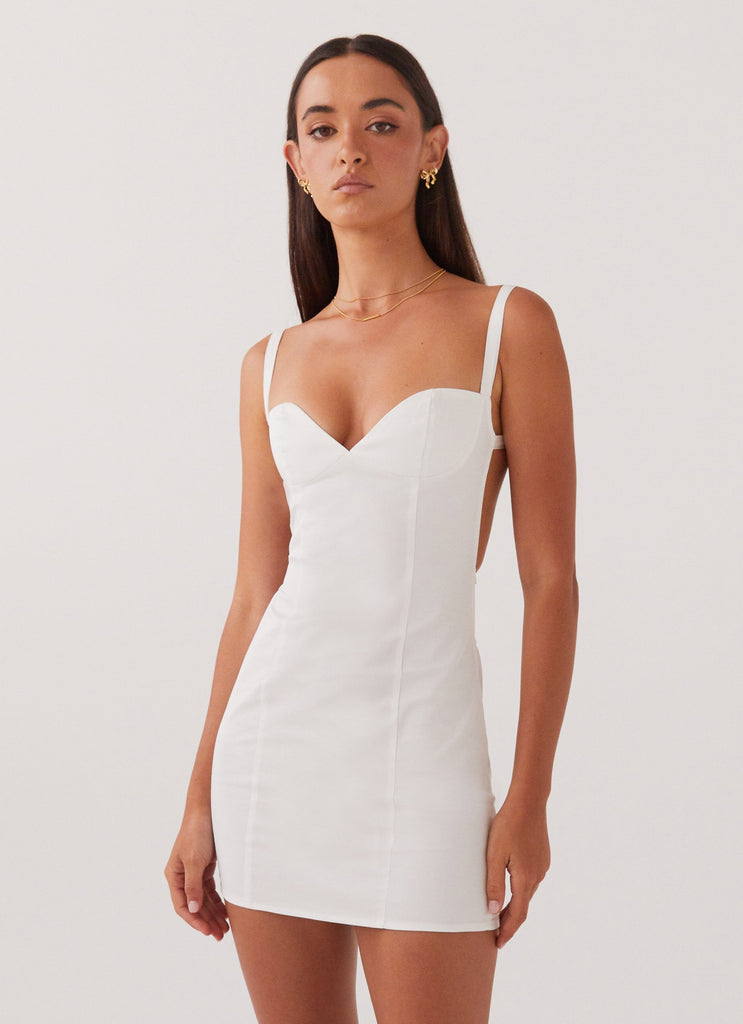 Womens Naomi Backless Mini Dress in the colour White in front of a light grey background