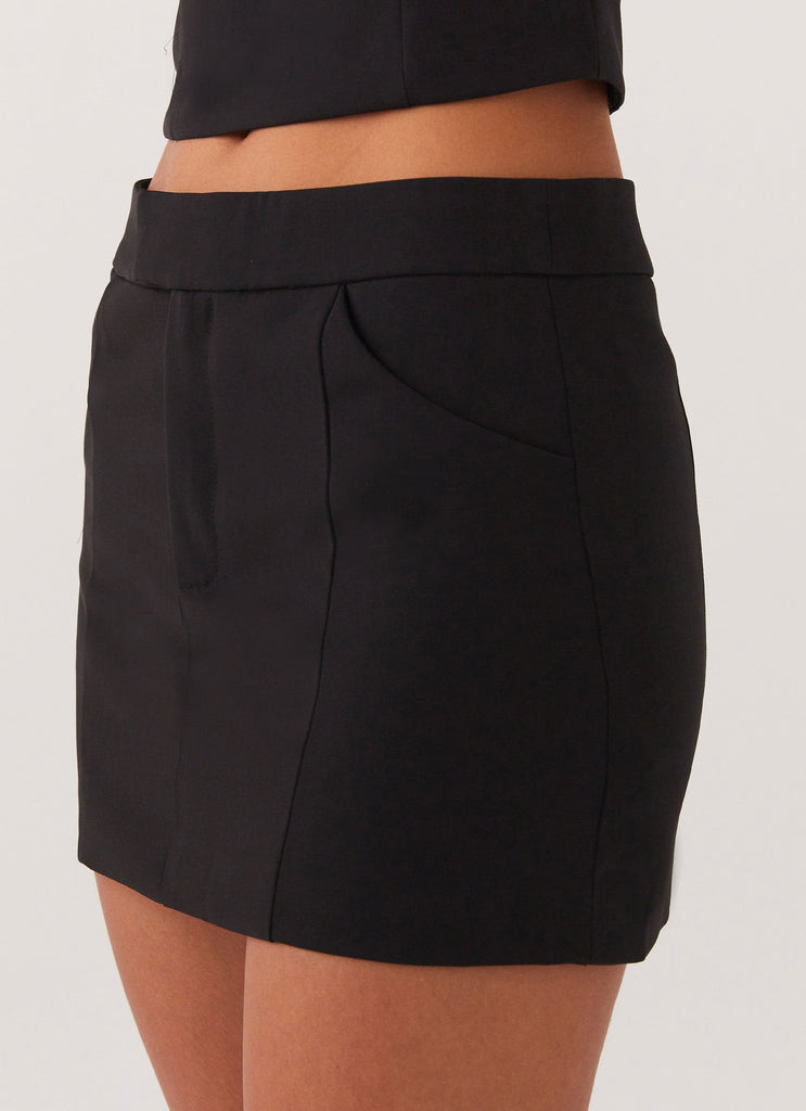 Womens Eliana Suit Mini Skirt in the colour Black in front of a light grey background