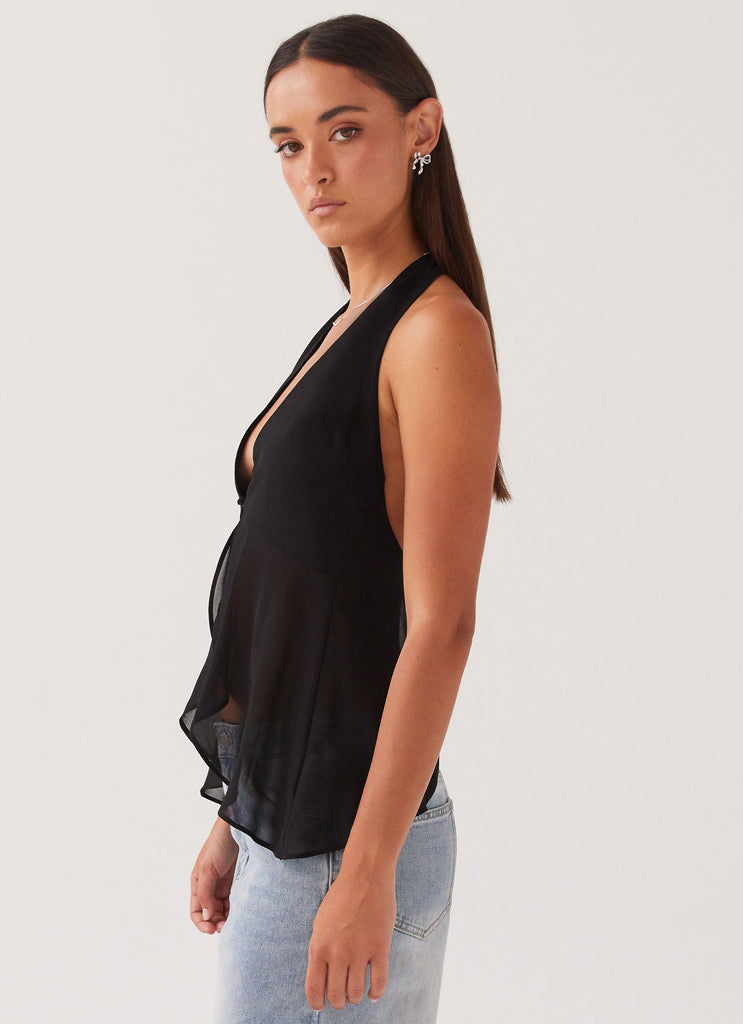 Womens At Last Halterneck Top in the colour Black in front of a light grey background