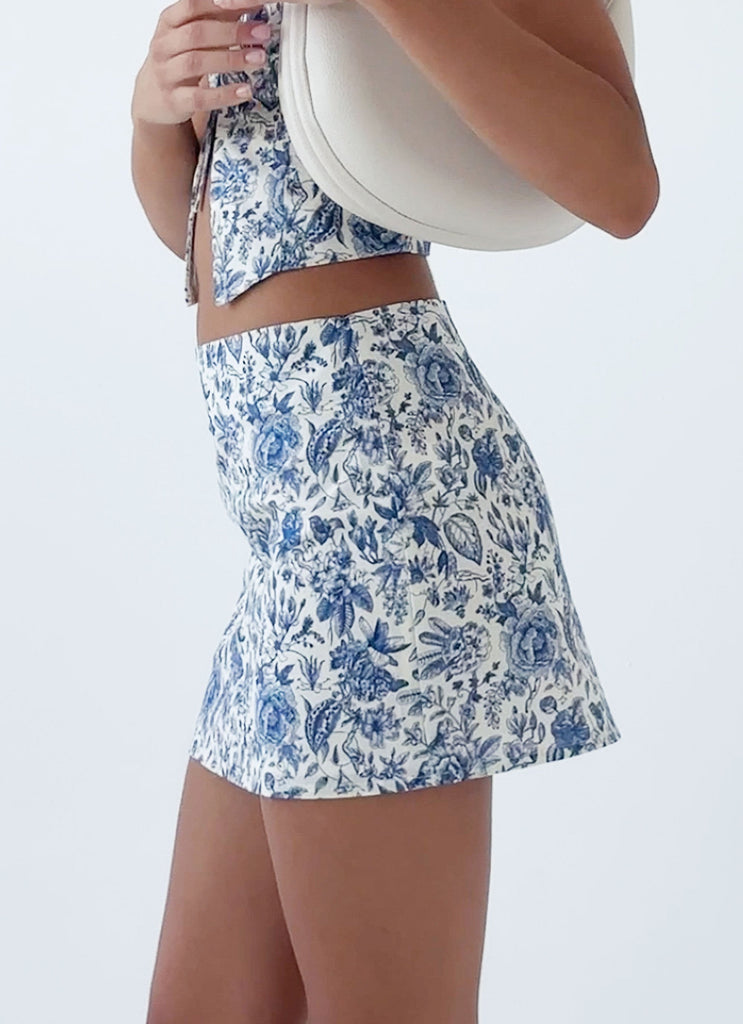 Womens Take Me Away Mini Skirt in the colour Blue Paisley in front of a light grey background