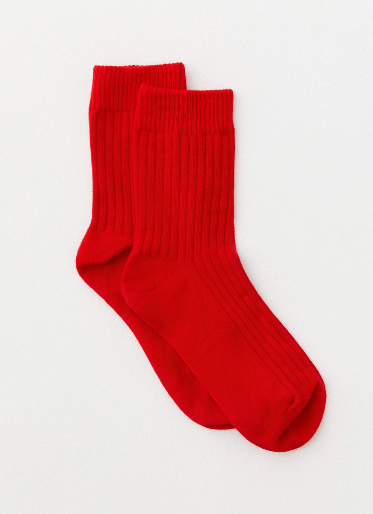 Womens Yelina Slouch Socks in the colour Red in front of a light grey background