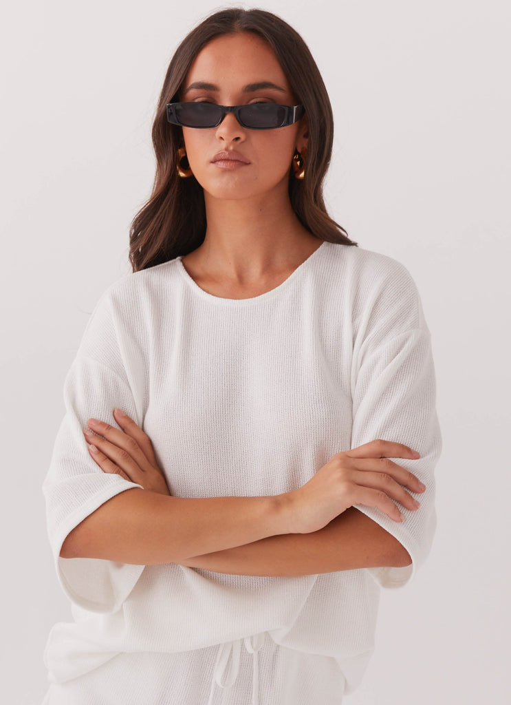 Womens Windsor Sunglasses in the colour Black in front of a light grey background