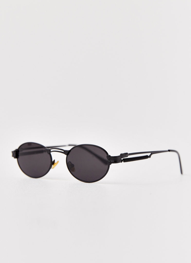 Womens Starbeam Sunglasses in the colour Black in front of a light grey background