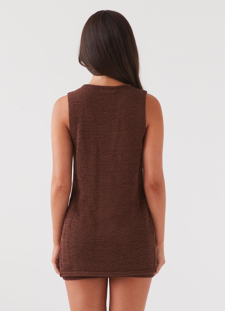 Womens Capri Glow Knit Top in the colour Chocolate in front of a light grey background