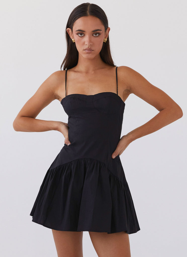 Womens Endless Summer Mini Dress in the colour Black in front of a light grey background