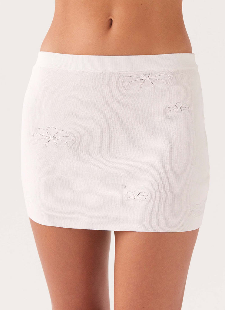 Womens Holly Knit Mini Skirt in the colour White in front of a light grey background