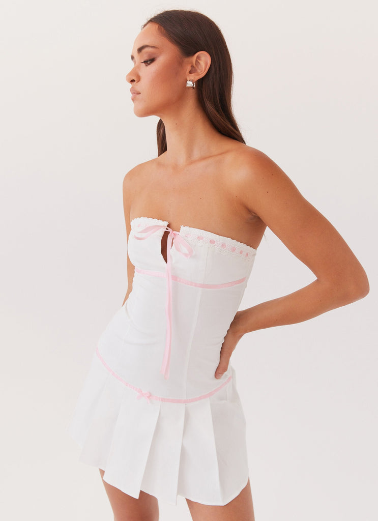 Womens Candy Coated Bustier Mini Dress in the colour Pink Ribbon in front of a light grey background