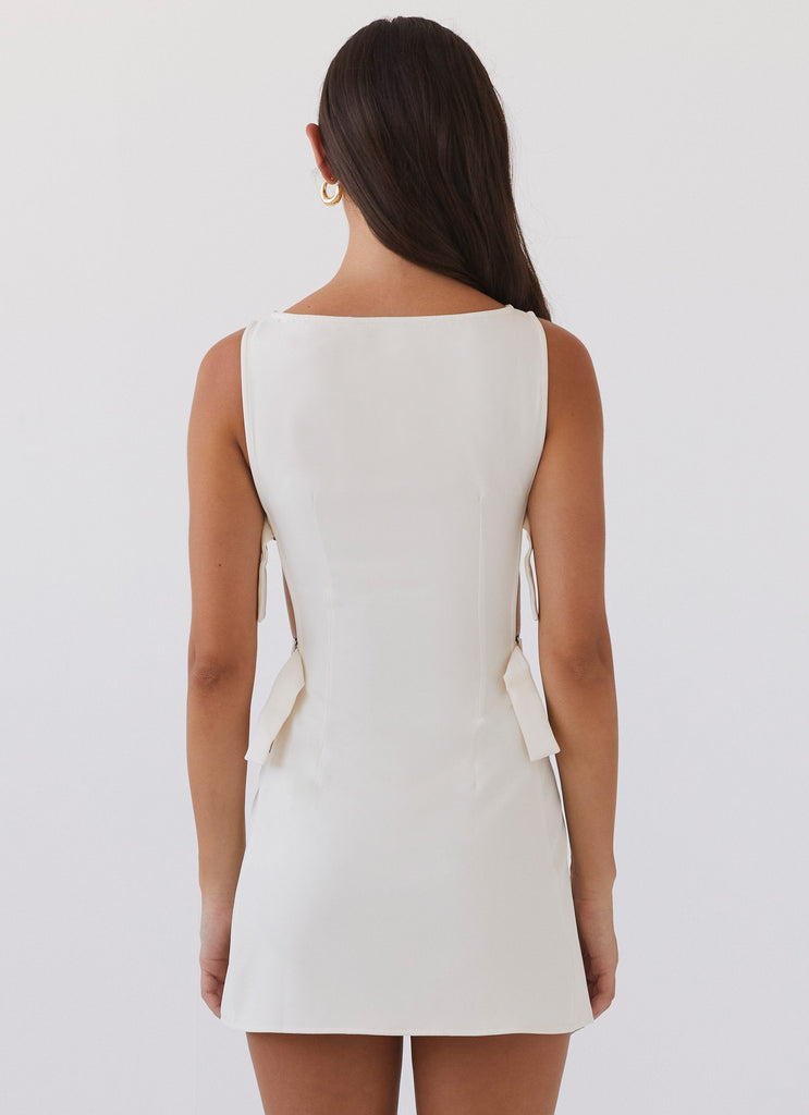 Womens Cherish You Buckle Mini Dress in the colour Ivory in front of a light grey background