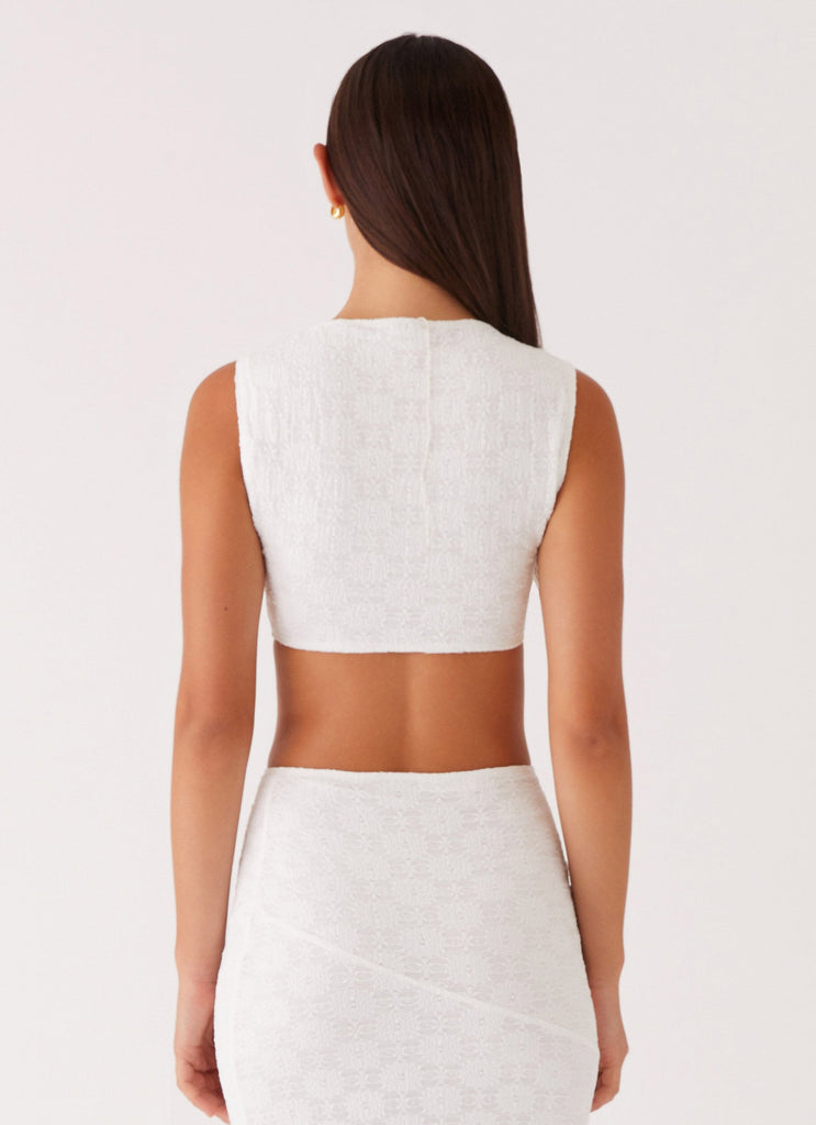 Womens Issey Crop Top in the colour White in front of a light grey background