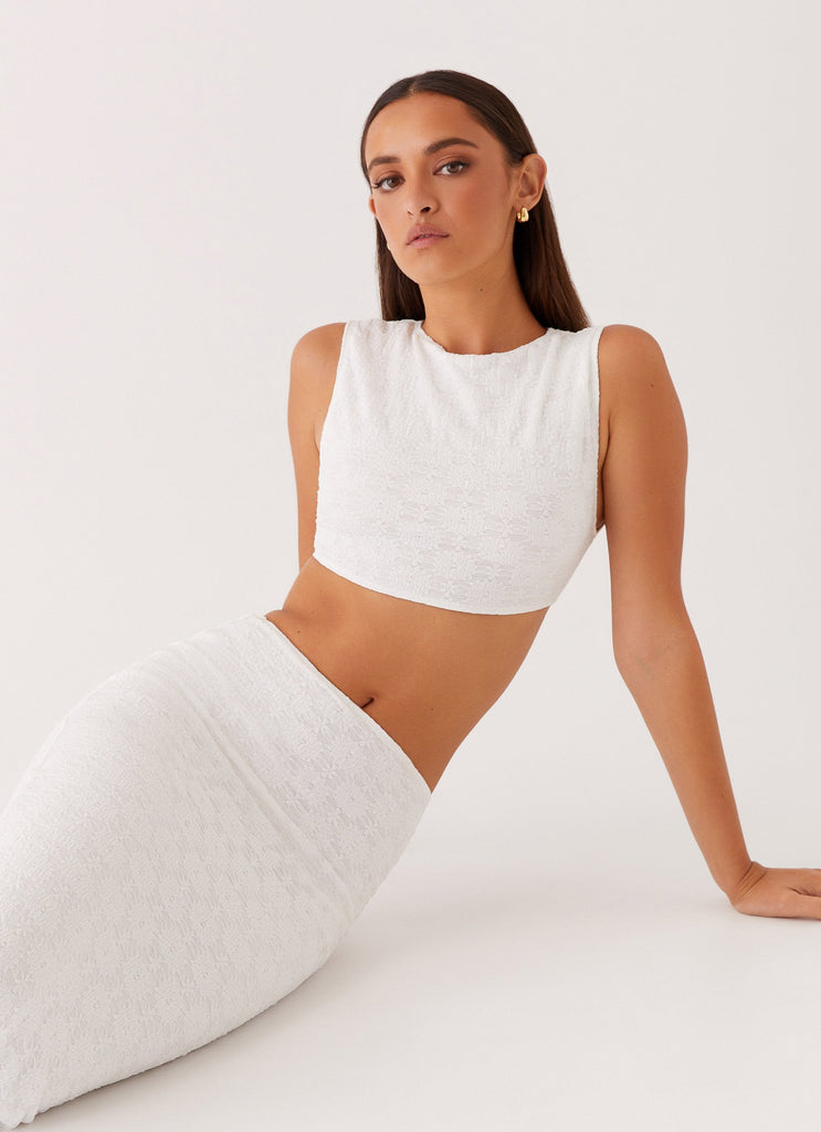 Womens Issey Crop Top in the colour White in front of a light grey background