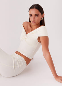 Womens Trixie Twist Off Shoulder Top in the colour Ivory in front of a light grey background